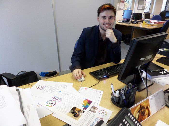 Gerraint at his desk in Learning Disability Wales