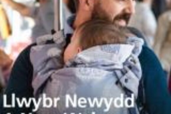 Cover of the consultation document with the picture of a young white man with a baby on a bus